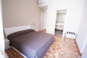 Postel nebo postele na pokoji v ubytování Vantaggio Apartment