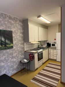 Η κουζίνα ή μικρή κουζίνα στο Workershotel Mariestad +10 φωτογραφίες