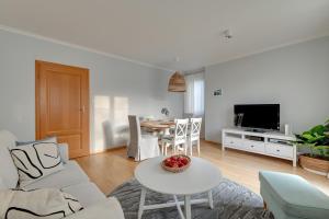 TV a/nebo společenská místnost v ubytování Lion Apartments - Amalfi Quiet Family 3 Bedr Apartment