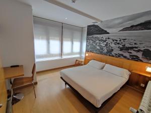 Postel nebo postele na pokoji v ubytování Hotel Dabeleira + 33 fotografií