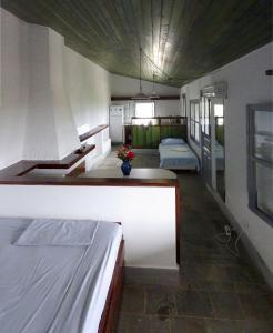 Ένα ή περισσότερα κρεβάτια σε δωμάτιο στο To Spitaki House