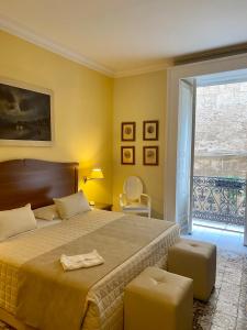 Hotel Akropolis - Museum Hotel客房内的一张或多张床位