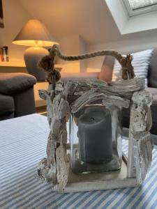 Ένα ή περισσότερα κρεβάτια σε δωμάτιο στο TiWu - Ferienwohnungen