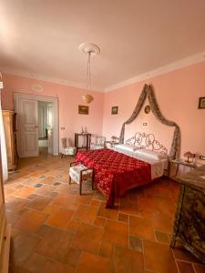 Llit o llits en una habitació de Palazzo Pascale