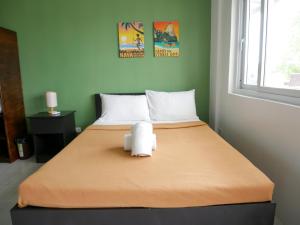 Postel nebo postele na pokoji v ubytování Hava Resort Calatagan