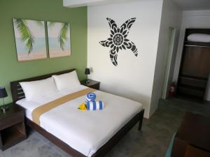 Postel nebo postele na pokoji v ubytování Hava Resort Calatagan