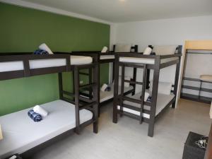 Postel nebo postele na pokoji v ubytování Hava Resort Calatagan