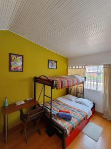 Llit o llits en una habitació de ZIPA HOSTEL