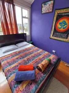 Llit o llits en una habitació de ZIPA HOSTEL