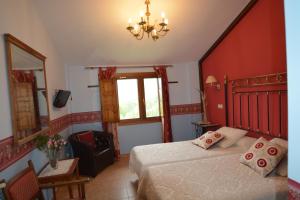 Cama o camas de una habitación en Hotel Rural Remanso