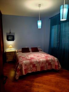 Postel nebo postele na pokoji v ubytování Casa Cotis Beceite