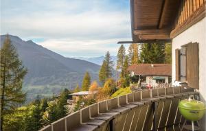 a balcony with a view of the mountains at 3 Bedroom Lovely Home In Schnberg in Mieders