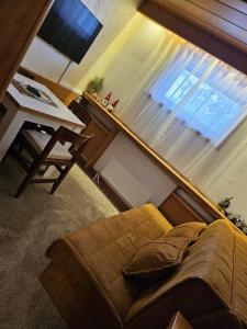 TV a/nebo společenská místnost v ubytování Apartman 602