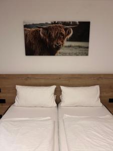 Postel nebo postele na pokoji v ubytování Gasthaus Engel + 1 fotografie