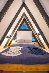 Кровать или кровати в номере Villa Lounge