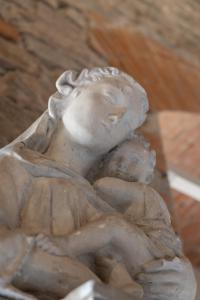 a statue of a woman holding a baby at Old Bridge large and unique artful apartment with elevator in Florence