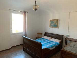 Katil atau katil-katil dalam bilik di Ospitalità rurale
