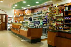 a store with a counter in a grocery store at B&B Spanò in Polistena