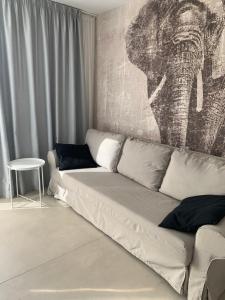 Łóżko lub łóżka w pokoju w obiekcie Suite SARA Playa Jandia