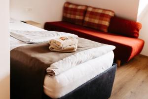 Ліжко або ліжка в номері Hotel Murat