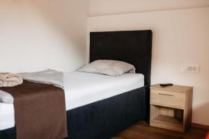 Ліжко або ліжка в номері Hotel Murat