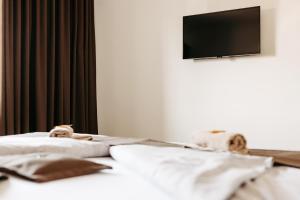 Ліжко або ліжка в номері Hotel Murat