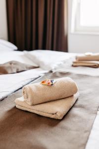 Ліжко або ліжка в номері Hotel Murat