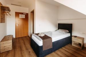 Ліжко або ліжка в номері Hotel Murat