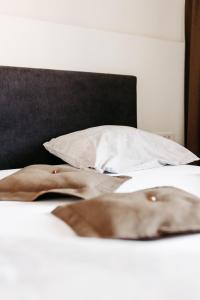 Ліжко або ліжка в номері Hotel Murat