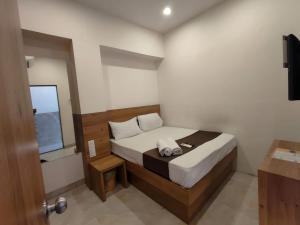 Cama o camas de una habitación en Hotel Apple Inn - Santacruz