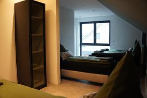 Postel nebo postele na pokoji v ubytování Ferienhaus in Lüneburg