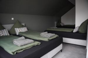 Кровать или кровати в номере Ferienhaus in Lüneburg