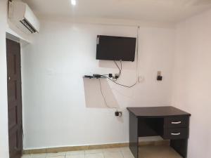 TV a/nebo společenská místnost v ubytování Vee homes