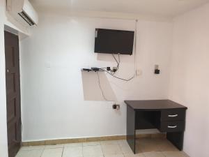 TV a/nebo společenská místnost v ubytování Vee homes