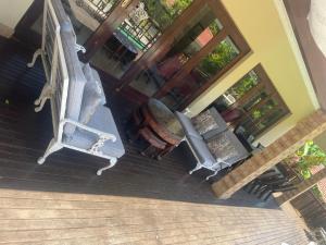 an overhead view of a porch with furniture on a deck at The Top Manor in Durban