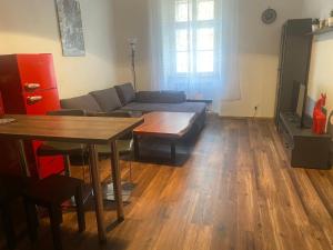 Posezení v ubytování City Apartment + 12 fotografií