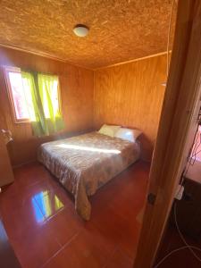 Ein Bett oder Betten in einem Zimmer der Unterkunft Pieza Triple, Villa Cerro Castillo, Baño y Areas Compartidas