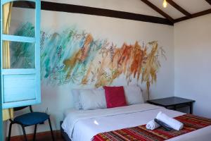 Postel nebo postele na pokoji v ubytování Hotel FLORA Suesca