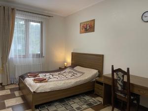 Postel nebo postele na pokoji v ubytování Оранта