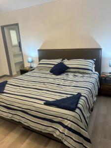 Postel nebo postele na pokoji v ubytování Villa Maria