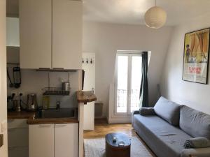 Kuchyň nebo kuchyňský kout v ubytování 2 pièces sous les toits 6 personnes calme lumineux équipé