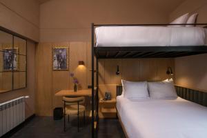 Dviaukštė lova arba lovos apgyvendinimo įstaigoje Motto By Hilton Cusco