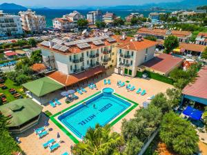 an aerial view of a resort with a swimming pool at Sunlight Otel Fethiye in Fethiye