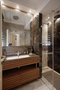 Ett badrum på Zemun Center LUX 3 bedroom