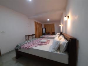 Postel nebo postele na pokoji v ubytování Amaya View Guest Inn + 21 fotografií