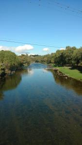 a view of a river from a bridge at Dpto Santa Rosa in Santa Rosa de Calamuchita