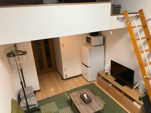 an overhead view of a living room with a refrigerator at SAKURA Stay FUKUOKA2 in Fukuoka