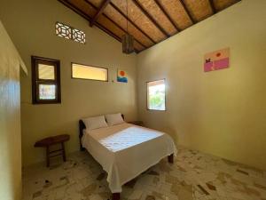 Postel nebo postele na pokoji v ubytování Casa na lagoa azul