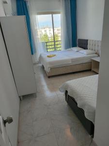 Postel nebo postele na pokoji v ubytování Emir Hotel Belek