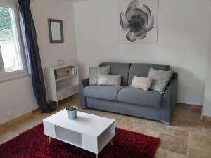 Posezení v ubytování Joli studio calme et moderne